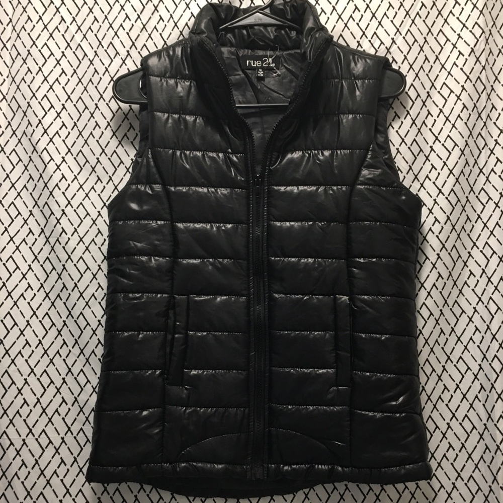 NWOT!! Super cute black puffer vest! Never worn!